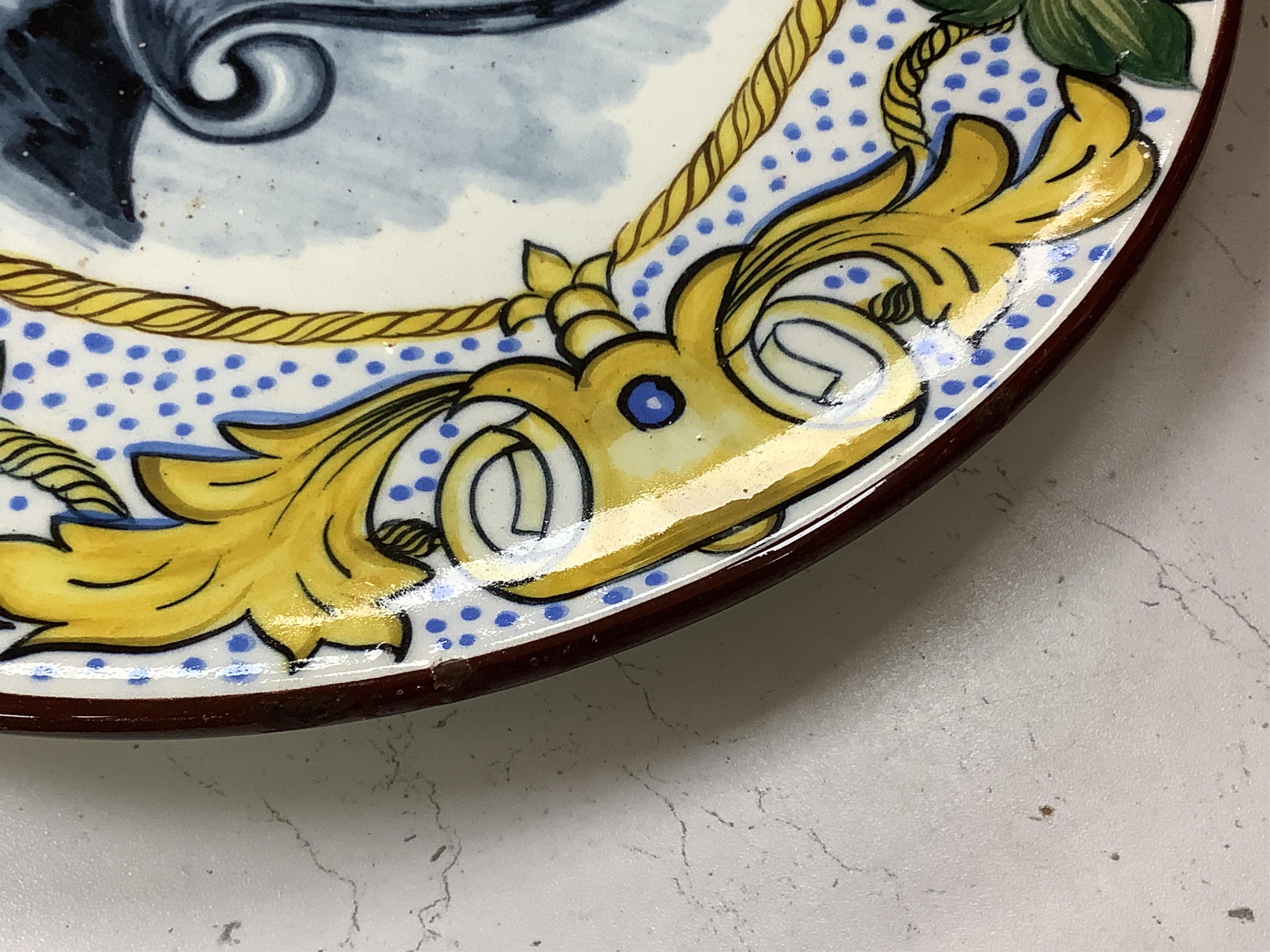 A Gustavsberg Argenta ware footed dish, a signed maiolica charger and a studio pottery crackle glazed bowl, largest 35cm